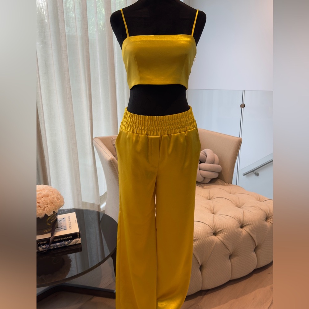 Cinq a sept pant and cropped top set in yellow gold satin.